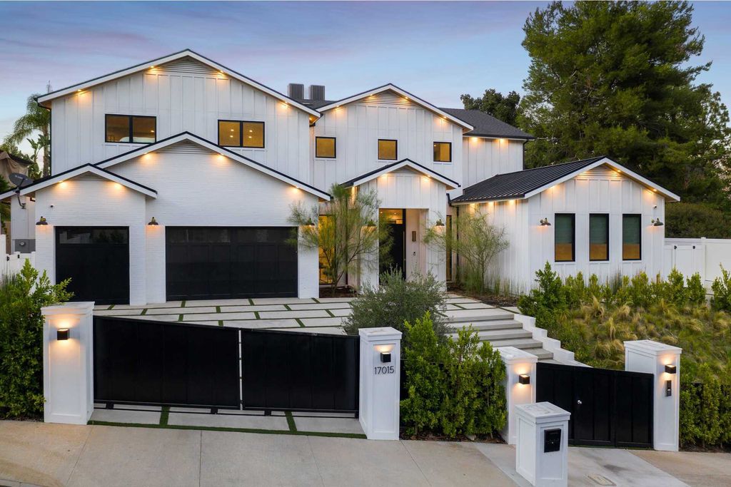The Modern Farmhouse in Encino is a marvel at the grand scale, gorgeous fixtures, layered textures, and sleek design now available for sale. This home located at 17015 Adlon Rd, Encino, California; offering 6 bedrooms and 10 bathrooms with over 8,900 square feet of living spaces. 