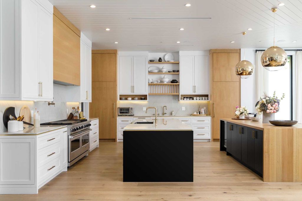 The Modern Farmhouse in Encino is a marvel at the grand scale, gorgeous fixtures, layered textures, and sleek design now available for sale. This home located at 17015 Adlon Rd, Encino, California; offering 6 bedrooms and 10 bathrooms with over 8,900 square feet of living spaces. 
