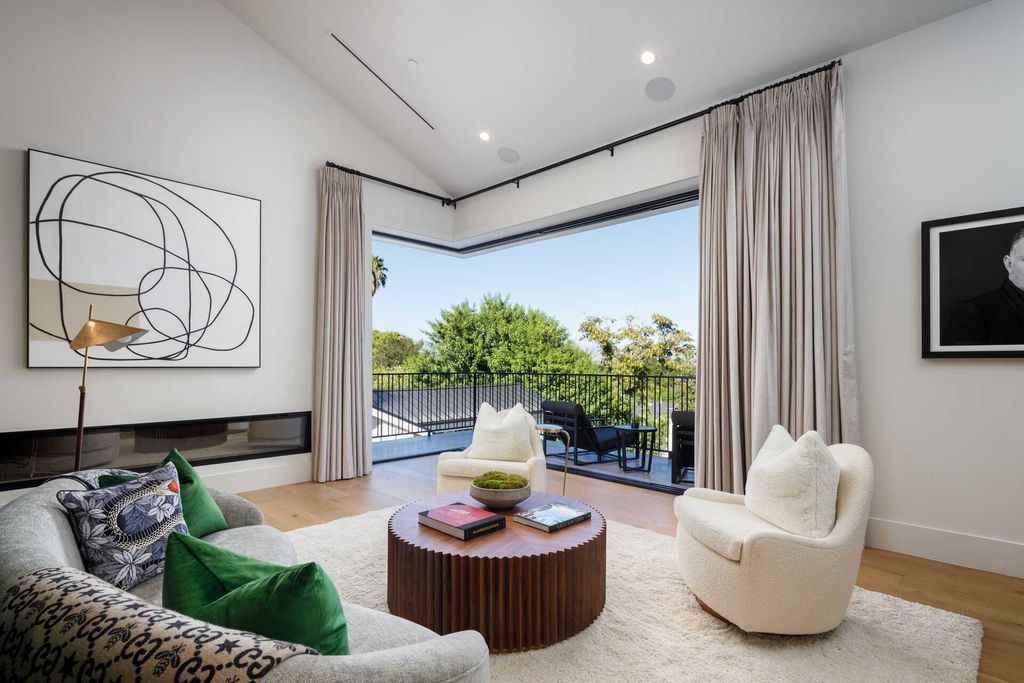 The Modern Farmhouse in Encino is a marvel at the grand scale, gorgeous fixtures, layered textures, and sleek design now available for sale. This home located at 17015 Adlon Rd, Encino, California; offering 6 bedrooms and 10 bathrooms with over 8,900 square feet of living spaces. 