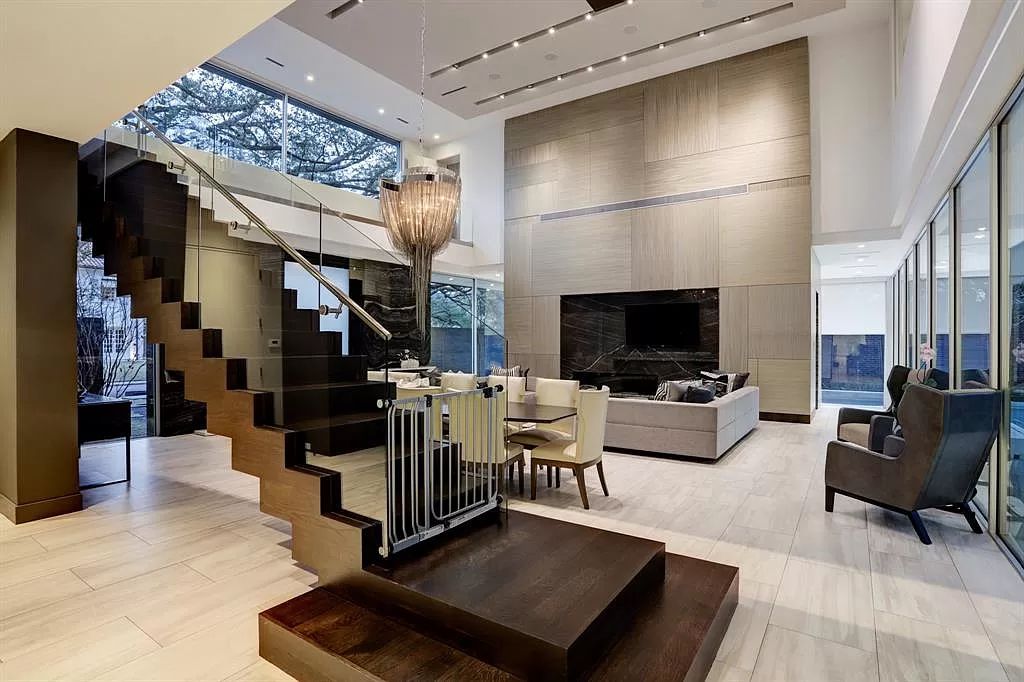 The masterful custom home in Houston offers modern contemporary detail and clean-line architecture mixed with the warmth of modern construction now available for sale. This home located at 4001 Ella Lee Ln, Houston, Texas; offering 4 bedrooms and 6 bathrooms with over 6,300 square feet of living spaces.