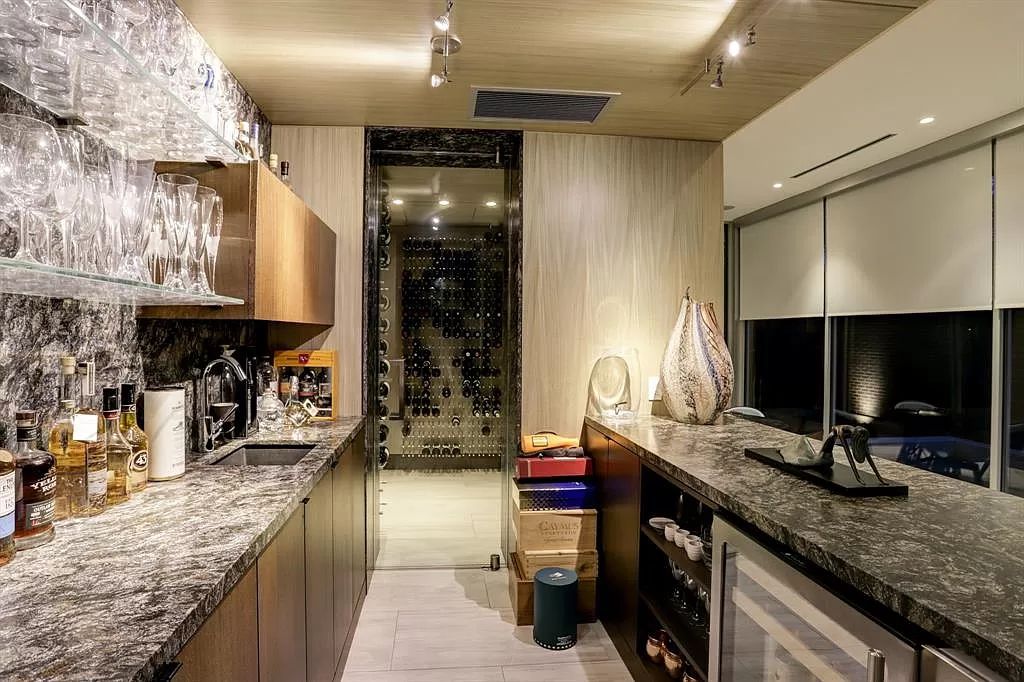 The masterful custom home in Houston offers modern contemporary detail and clean-line architecture mixed with the warmth of modern construction now available for sale. This home located at 4001 Ella Lee Ln, Houston, Texas; offering 4 bedrooms and 6 bathrooms with over 6,300 square feet of living spaces.