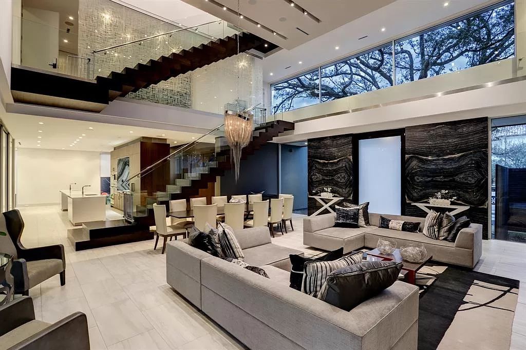 The masterful custom home in Houston offers modern contemporary detail and clean-line architecture mixed with the warmth of modern construction now available for sale. This home located at 4001 Ella Lee Ln, Houston, Texas; offering 4 bedrooms and 6 bathrooms with over 6,300 square feet of living spaces.