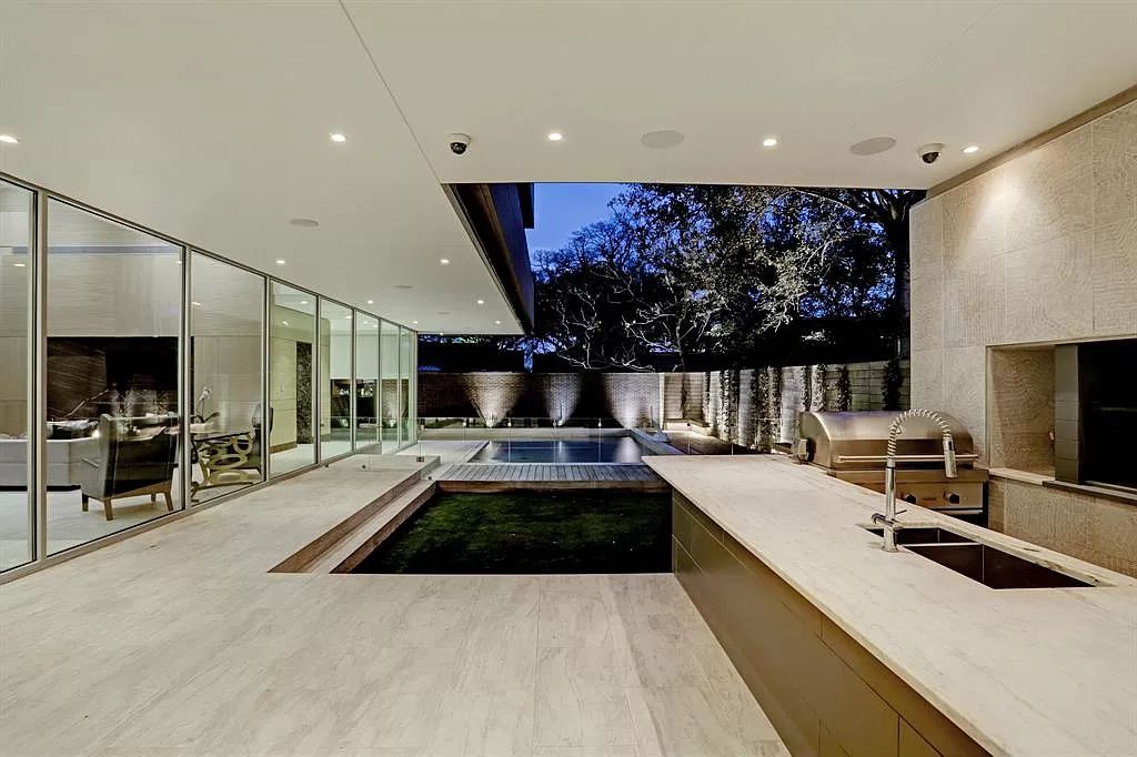 The masterful custom home in Houston offers modern contemporary detail and clean-line architecture mixed with the warmth of modern construction now available for sale. This home located at 4001 Ella Lee Ln, Houston, Texas; offering 4 bedrooms and 6 bathrooms with over 6,300 square feet of living spaces.