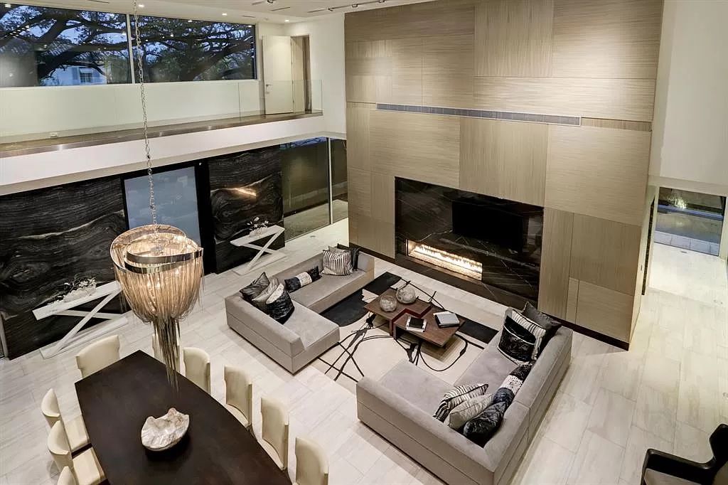 The masterful custom home in Houston offers modern contemporary detail and clean-line architecture mixed with the warmth of modern construction now available for sale. This home located at 4001 Ella Lee Ln, Houston, Texas; offering 4 bedrooms and 6 bathrooms with over 6,300 square feet of living spaces.
