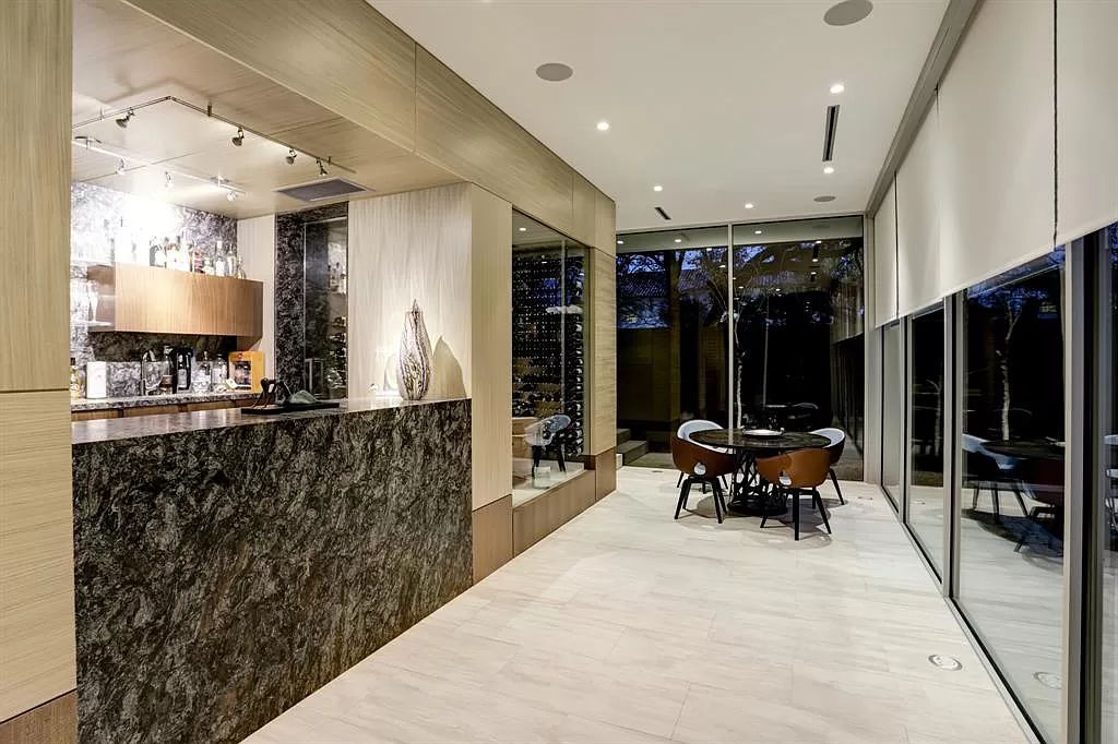 The masterful custom home in Houston offers modern contemporary detail and clean-line architecture mixed with the warmth of modern construction now available for sale. This home located at 4001 Ella Lee Ln, Houston, Texas; offering 4 bedrooms and 6 bathrooms with over 6,300 square feet of living spaces.