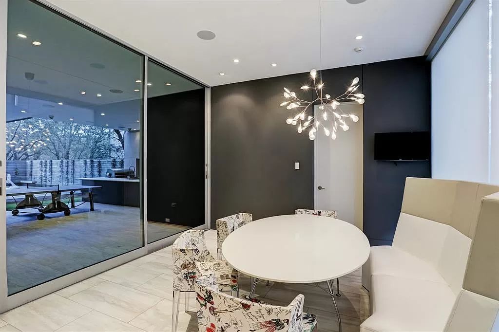 The masterful custom home in Houston offers modern contemporary detail and clean-line architecture mixed with the warmth of modern construction now available for sale. This home located at 4001 Ella Lee Ln, Houston, Texas; offering 4 bedrooms and 6 bathrooms with over 6,300 square feet of living spaces.