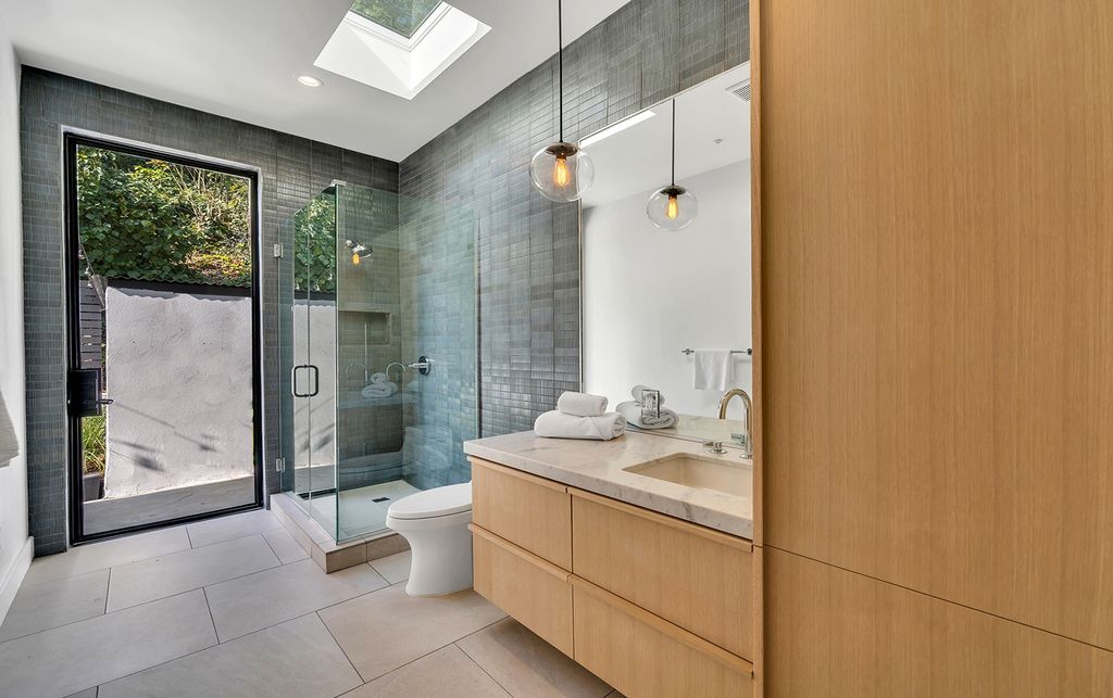 The New Construction Home in Brentwood has been masterfully designed to create intimate environments and spaces now available for sale. This home located at 3023 Elvill Dr, Los Angeles, California; offering 7 bedrooms and 7 bathrooms with over 5,000square feet of living spaces.