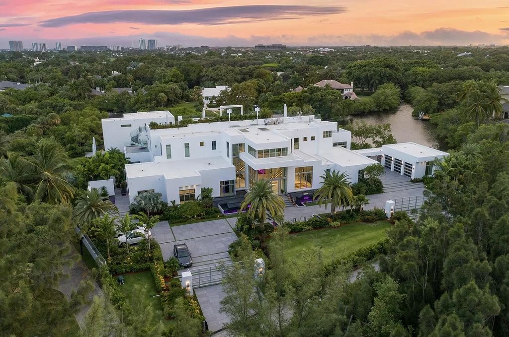 The Florida Contemporary Mansion is a luxurious masterpiece in the highly sought after enclave of Seminole Landing now available for sale. This home located at 1104 Seminole Blvd, North Palm Beach, Florida; offering 7 bedrooms and 8 bathrooms with over 17,000 square feet of living spaces. 