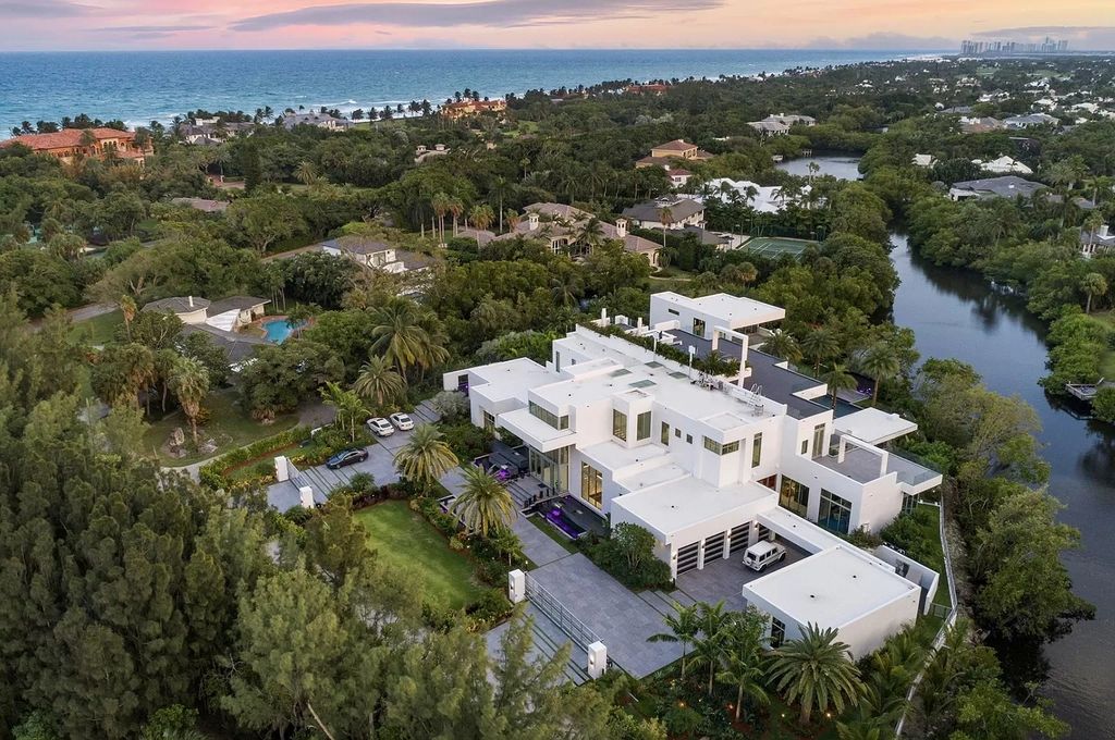 The Florida Contemporary Mansion is a luxurious masterpiece in the highly sought after enclave of Seminole Landing now available for sale. This home located at 1104 Seminole Blvd, North Palm Beach, Florida; offering 7 bedrooms and 8 bathrooms with over 17,000 square feet of living spaces. 