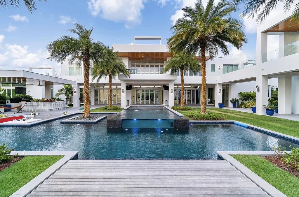 The Florida Contemporary Mansion is a luxurious masterpiece in the highly sought after enclave of Seminole Landing now available for sale. This home located at 1104 Seminole Blvd, North Palm Beach, Florida; offering 7 bedrooms and 8 bathrooms with over 17,000 square feet of living spaces. 