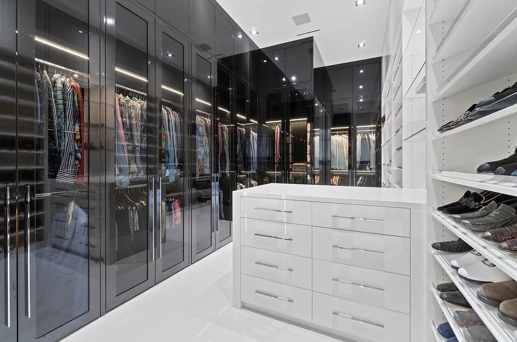 The Florida Contemporary Mansion is a luxurious masterpiece in the highly sought after enclave of Seminole Landing now available for sale. This home located at 1104 Seminole Blvd, North Palm Beach, Florida; offering 7 bedrooms and 8 bathrooms with over 17,000 square feet of living spaces. 