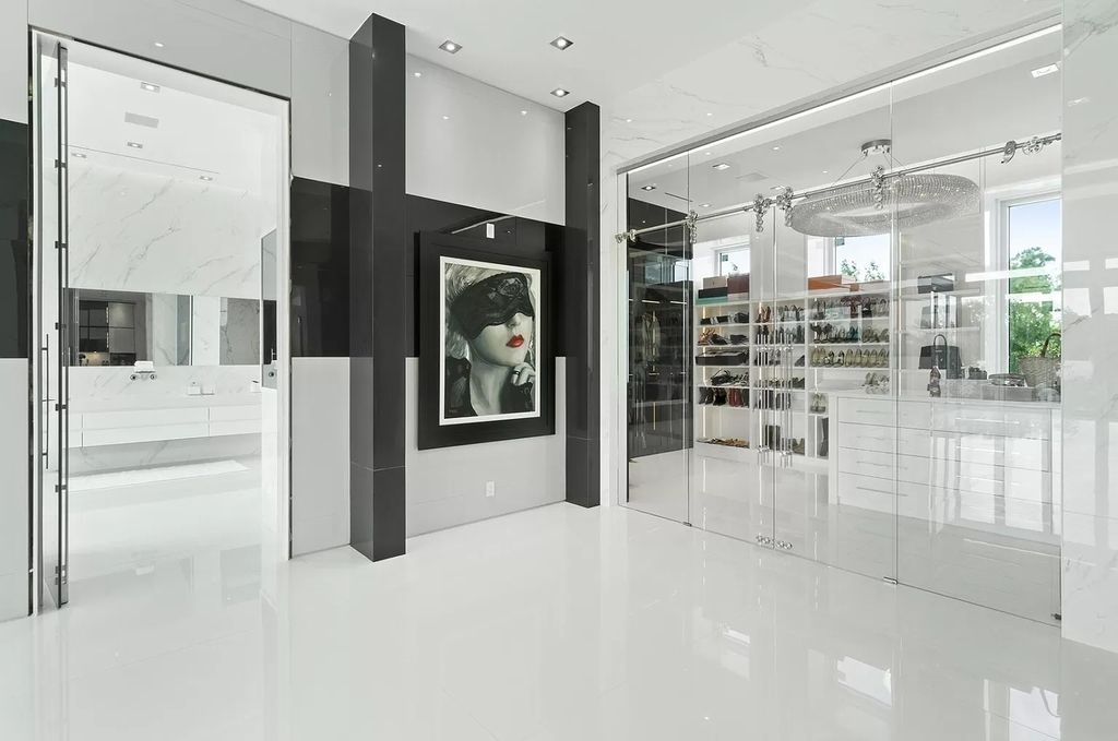 The Florida Contemporary Mansion is a luxurious masterpiece in the highly sought after enclave of Seminole Landing now available for sale. This home located at 1104 Seminole Blvd, North Palm Beach, Florida; offering 7 bedrooms and 8 bathrooms with over 17,000 square feet of living spaces. 
