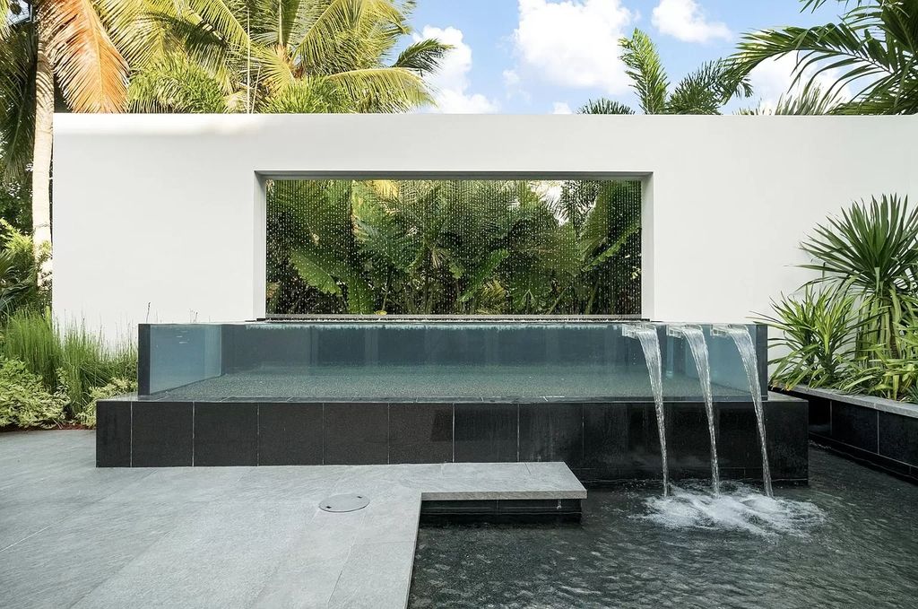 The Florida Contemporary Mansion is a luxurious masterpiece in the highly sought after enclave of Seminole Landing now available for sale. This home located at 1104 Seminole Blvd, North Palm Beach, Florida; offering 7 bedrooms and 8 bathrooms with over 17,000 square feet of living spaces. 