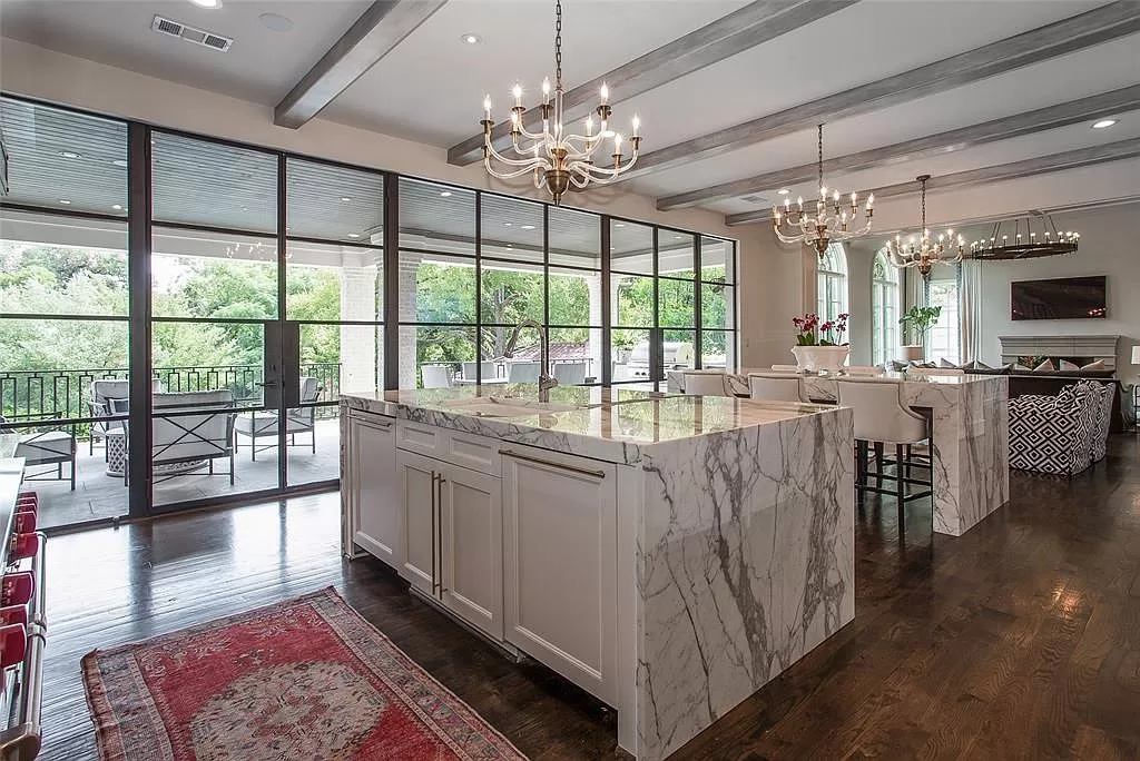 The Mediterranean Home in Texas is a luxurious estate heralds the highest standards in quality, ultimate luxury and privacy now available for sale. This home located at 2425 Stadium Dr, Fort Worth, Texas; offering 5 bedrooms and 8 bathrooms with over 10,000 square feet of living spaces.