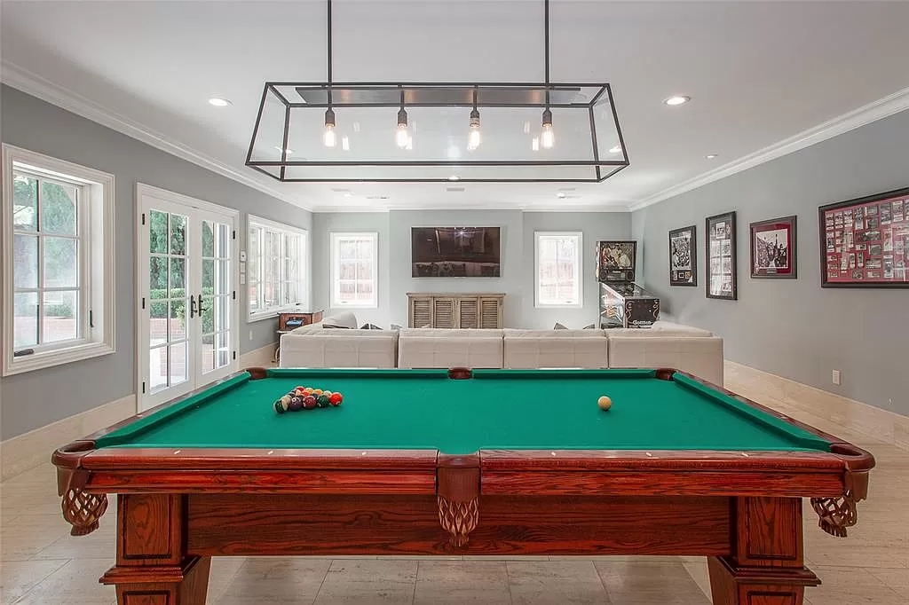 The Mediterranean Home in Texas is a luxurious estate heralds the highest standards in quality, ultimate luxury and privacy now available for sale. This home located at 2425 Stadium Dr, Fort Worth, Texas; offering 5 bedrooms and 8 bathrooms with over 10,000 square feet of living spaces.