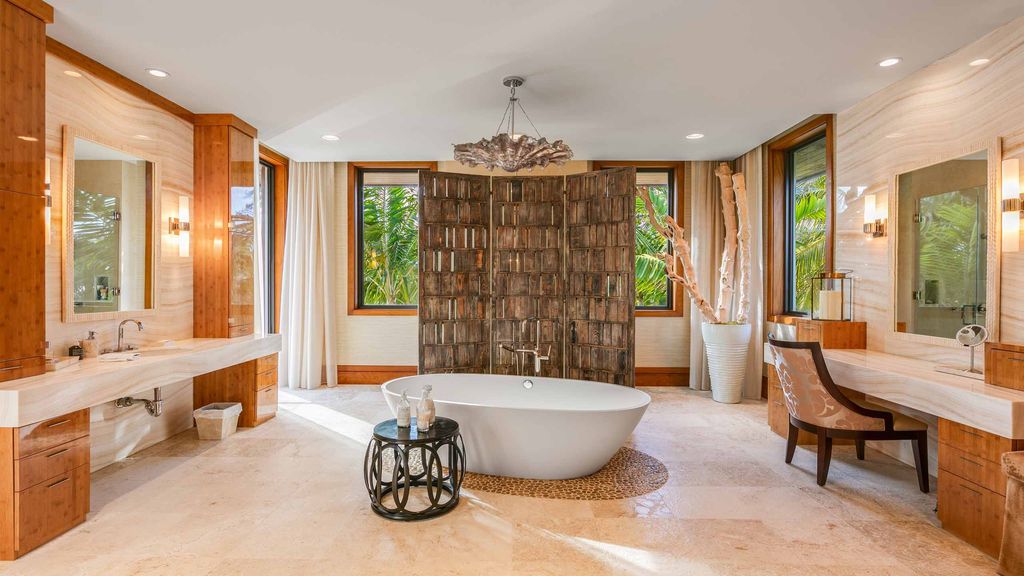 The Florida Mansion is an ocean to intracoastal compound is situated on 1.9 acres boasting 160 feet of direct oceanfrontage now available for sale. This home located at 1780 S Ocean Blvd, Lantana, Florida; offering 5 bedrooms and 10 bathrooms with over 11,000 square feet of living spaces.