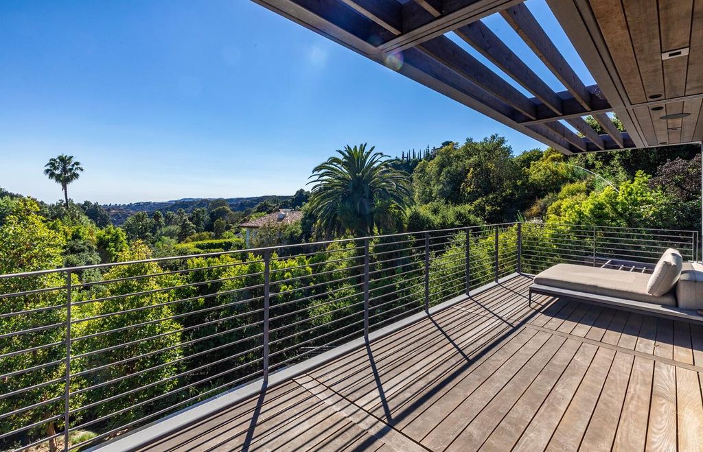 The Beverly Hills Home is a gated and secluded sanctuary with staggering vista views personifies quintessential California living now available for sale. This home located at 9321 Cherokee Ln, Beverly Hills, California; offering 5 bedrooms and 5 bathrooms with over 4,000 square feet of living spaces.