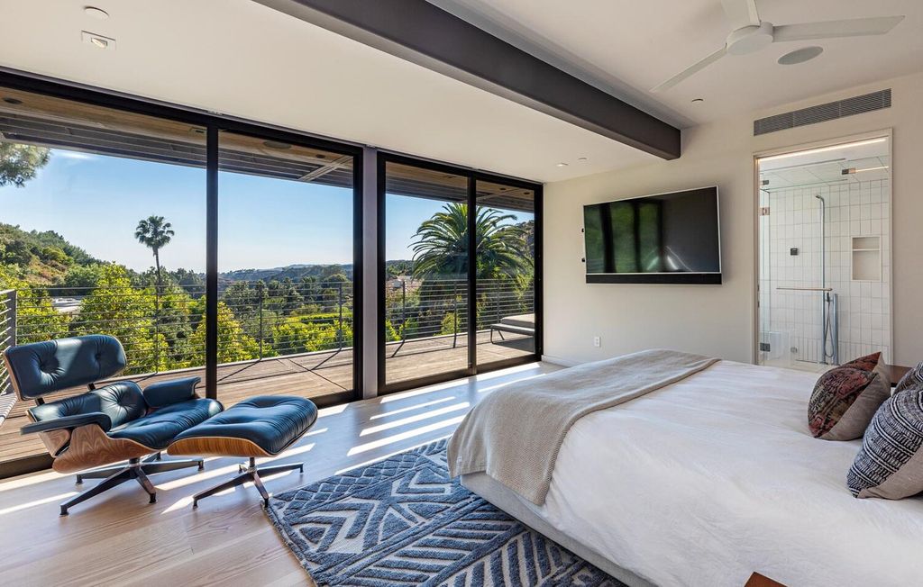 The Beverly Hills Home is a gated and secluded sanctuary with staggering vista views personifies quintessential California living now available for sale. This home located at 9321 Cherokee Ln, Beverly Hills, California; offering 5 bedrooms and 5 bathrooms with over 4,000 square feet of living spaces.