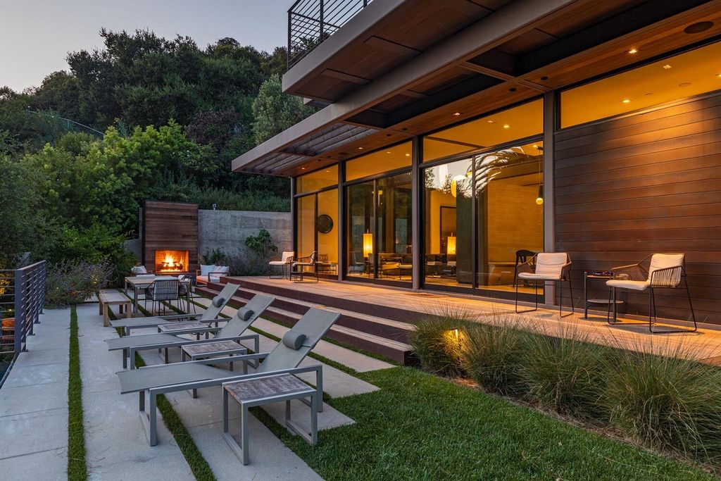 The Beverly Hills Home is a gated and secluded sanctuary with staggering vista views personifies quintessential California living now available for sale. This home located at 9321 Cherokee Ln, Beverly Hills, California; offering 5 bedrooms and 5 bathrooms with over 4,000 square feet of living spaces.