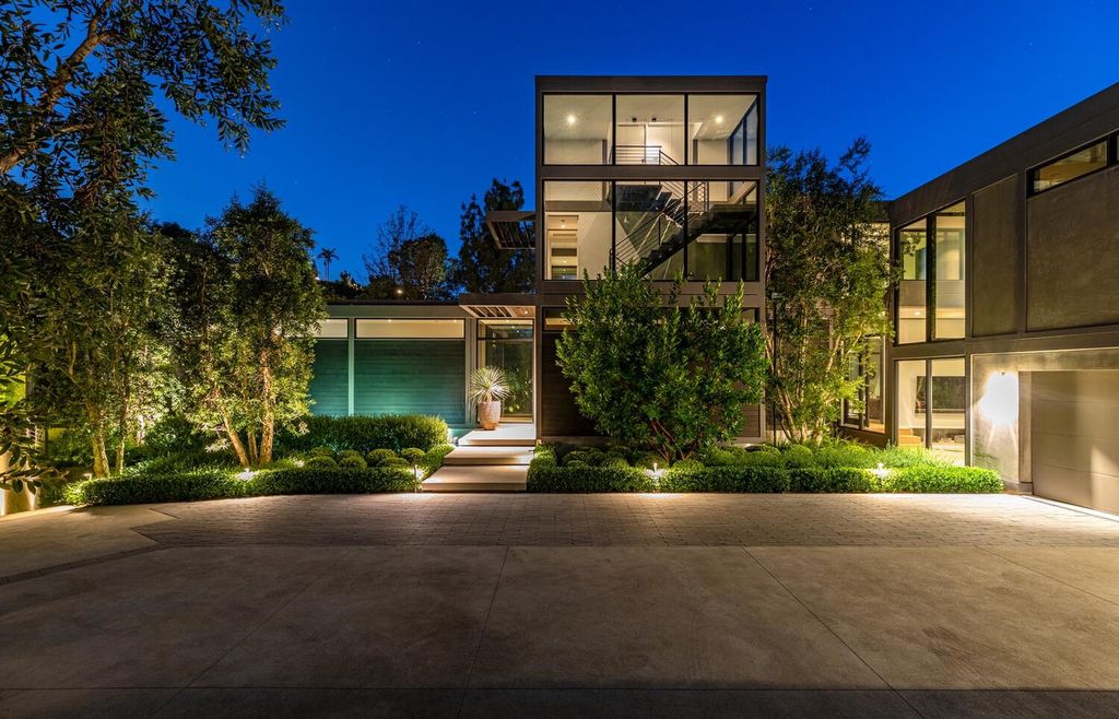 The Beverly Hills Home is a gated and secluded sanctuary with staggering vista views personifies quintessential California living now available for sale. This home located at 9321 Cherokee Ln, Beverly Hills, California; offering 5 bedrooms and 5 bathrooms with over 4,000 square feet of living spaces.