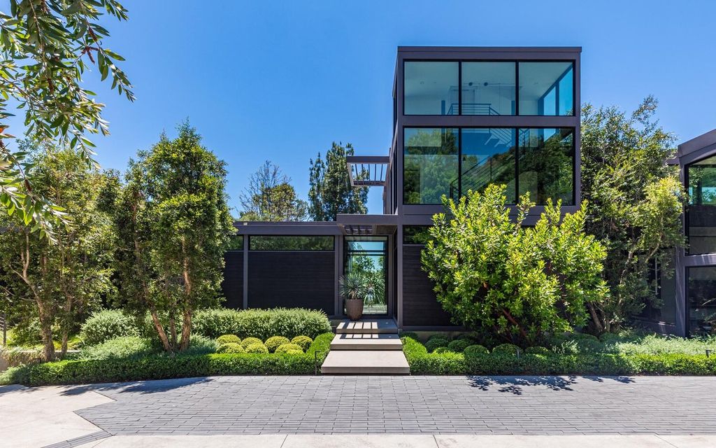 The Beverly Hills Home is a gated and secluded sanctuary with staggering vista views personifies quintessential California living now available for sale. This home located at 9321 Cherokee Ln, Beverly Hills, California; offering 5 bedrooms and 5 bathrooms with over 4,000 square feet of living spaces.