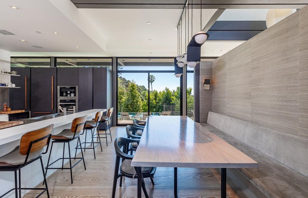 The Beverly Hills Home is a gated and secluded sanctuary with staggering vista views personifies quintessential California living now available for sale. This home located at 9321 Cherokee Ln, Beverly Hills, California; offering 5 bedrooms and 5 bathrooms with over 4,000 square feet of living spaces.