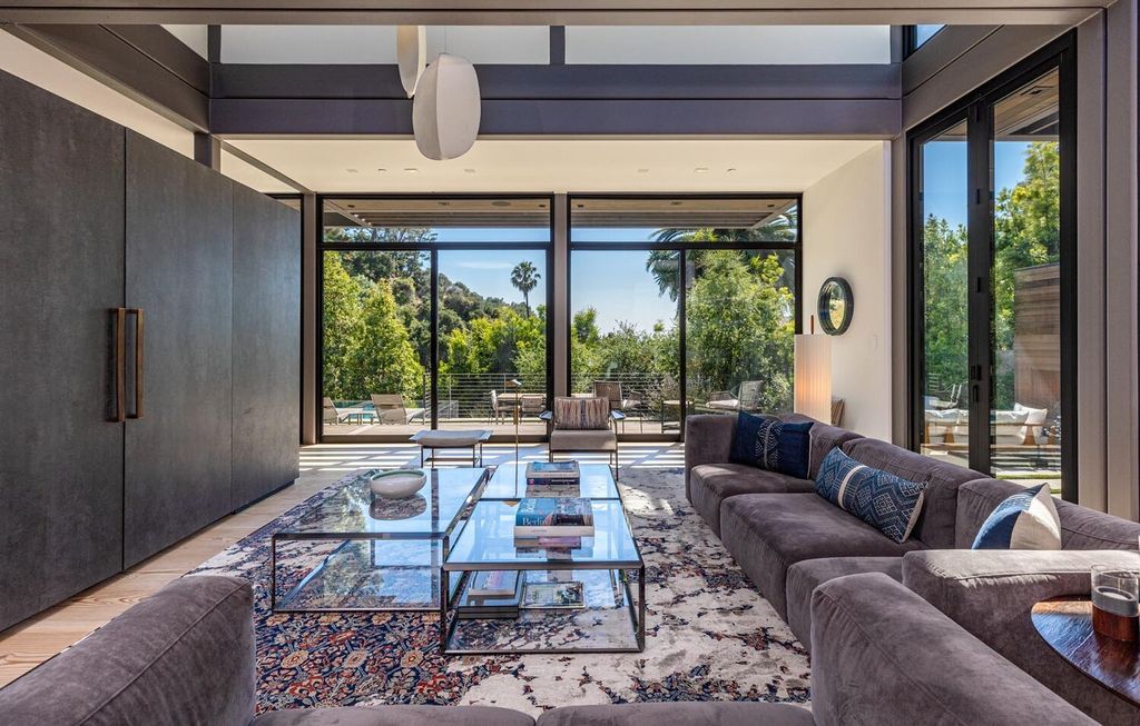The Beverly Hills Home is a gated and secluded sanctuary with staggering vista views personifies quintessential California living now available for sale. This home located at 9321 Cherokee Ln, Beverly Hills, California; offering 5 bedrooms and 5 bathrooms with over 4,000 square feet of living spaces.