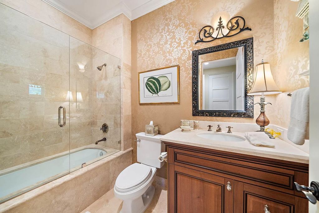 The Florida Home is a luxurious home offers a touch of Palm Beach in the heart of Jupiter now available for sale featuring privacy and security. This home located at 166 Bears Club Dr, Jupiter, Florida; offering 5 bedrooms and 8 bathrooms with over 7,800 square feet of living spaces.