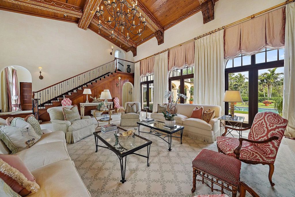 The Florida Home is a luxurious home offers a touch of Palm Beach in the heart of Jupiter now available for sale featuring privacy and security. This home located at 166 Bears Club Dr, Jupiter, Florida; offering 5 bedrooms and 8 bathrooms with over 7,800 square feet of living spaces.