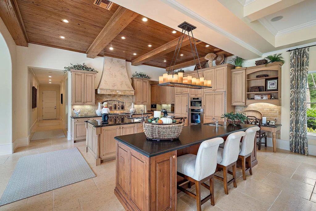The Florida Home is a luxurious home offers a touch of Palm Beach in the heart of Jupiter now available for sale featuring privacy and security. This home located at 166 Bears Club Dr, Jupiter, Florida; offering 5 bedrooms and 8 bathrooms with over 7,800 square feet of living spaces.