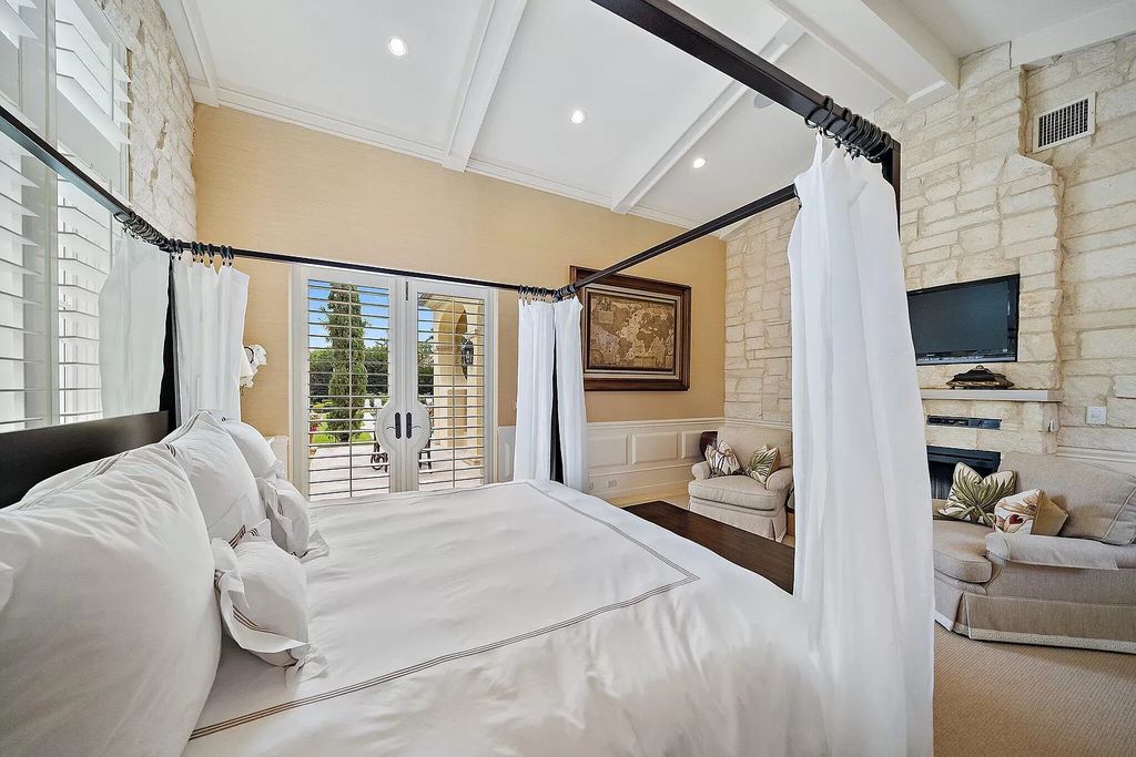 The Florida Home is a luxurious home offers a touch of Palm Beach in the heart of Jupiter now available for sale featuring privacy and security. This home located at 166 Bears Club Dr, Jupiter, Florida; offering 5 bedrooms and 8 bathrooms with over 7,800 square feet of living spaces.