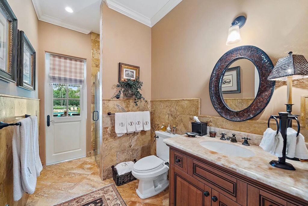 The Florida Home is a luxurious home offers a touch of Palm Beach in the heart of Jupiter now available for sale featuring privacy and security. This home located at 166 Bears Club Dr, Jupiter, Florida; offering 5 bedrooms and 8 bathrooms with over 7,800 square feet of living spaces.