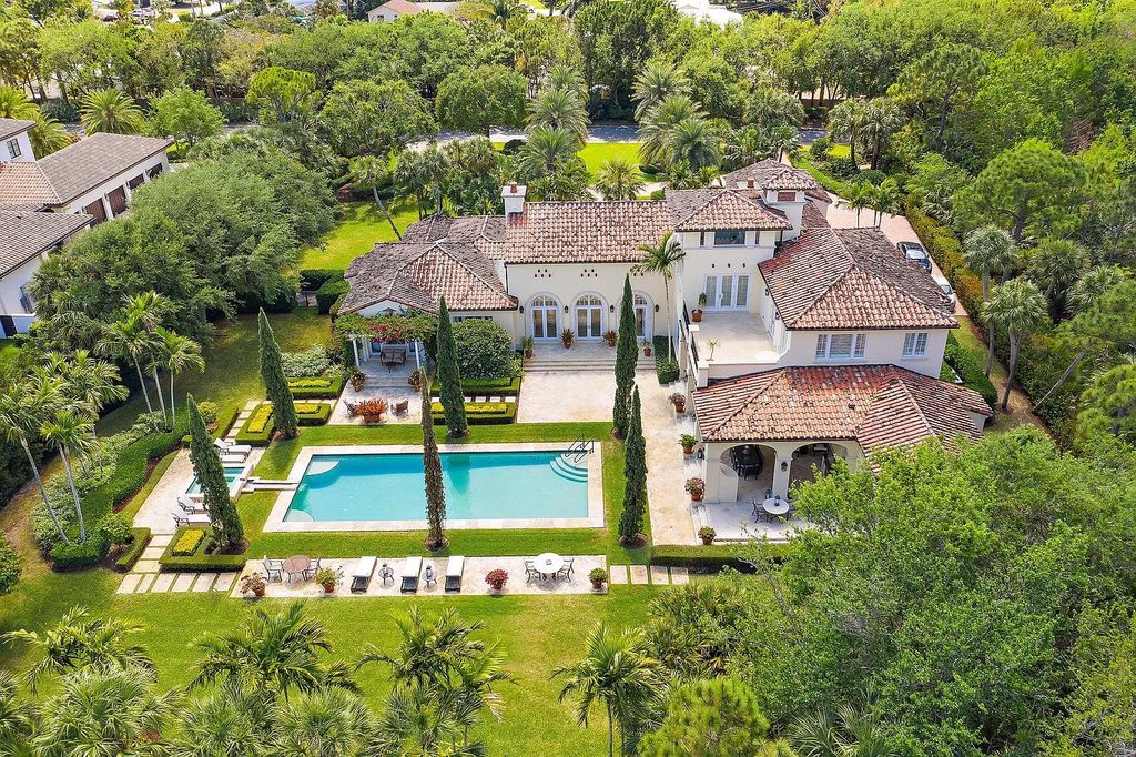The Florida Home is a luxurious home offers a touch of Palm Beach in the heart of Jupiter now available for sale featuring privacy and security. This home located at 166 Bears Club Dr, Jupiter, Florida; offering 5 bedrooms and 8 bathrooms with over 7,800 square feet of living spaces.