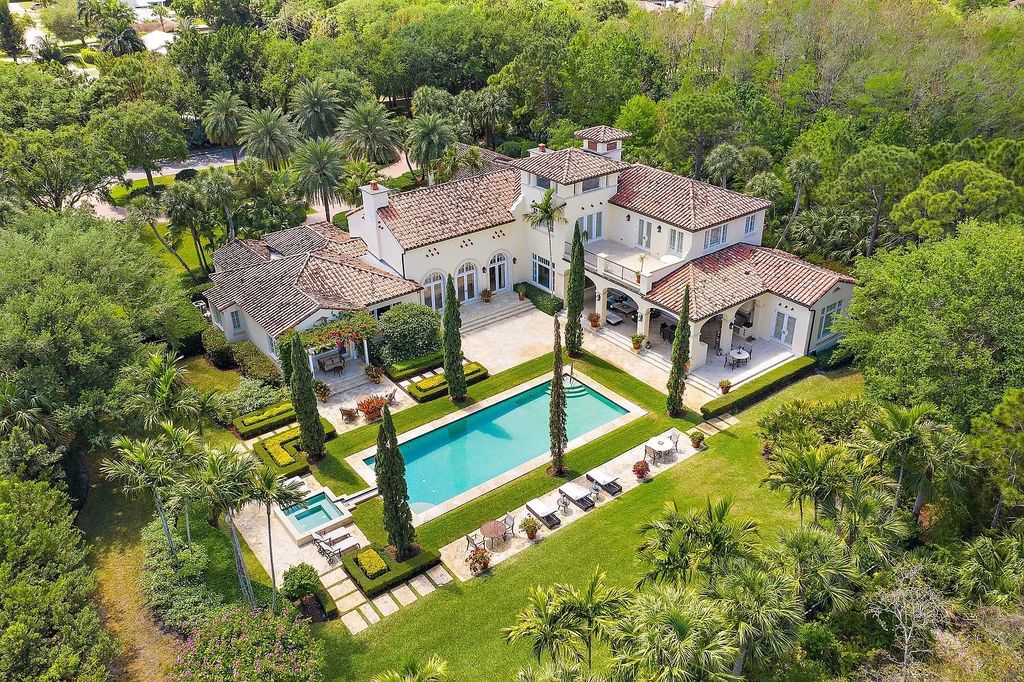 The Florida Home is a luxurious home offers a touch of Palm Beach in the heart of Jupiter now available for sale featuring privacy and security. This home located at 166 Bears Club Dr, Jupiter, Florida; offering 5 bedrooms and 8 bathrooms with over 7,800 square feet of living spaces.
