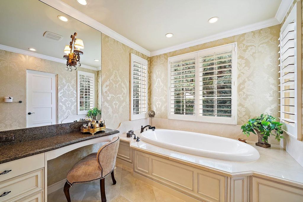 The Florida Home is a luxurious home offers a touch of Palm Beach in the heart of Jupiter now available for sale featuring privacy and security. This home located at 166 Bears Club Dr, Jupiter, Florida; offering 5 bedrooms and 8 bathrooms with over 7,800 square feet of living spaces.