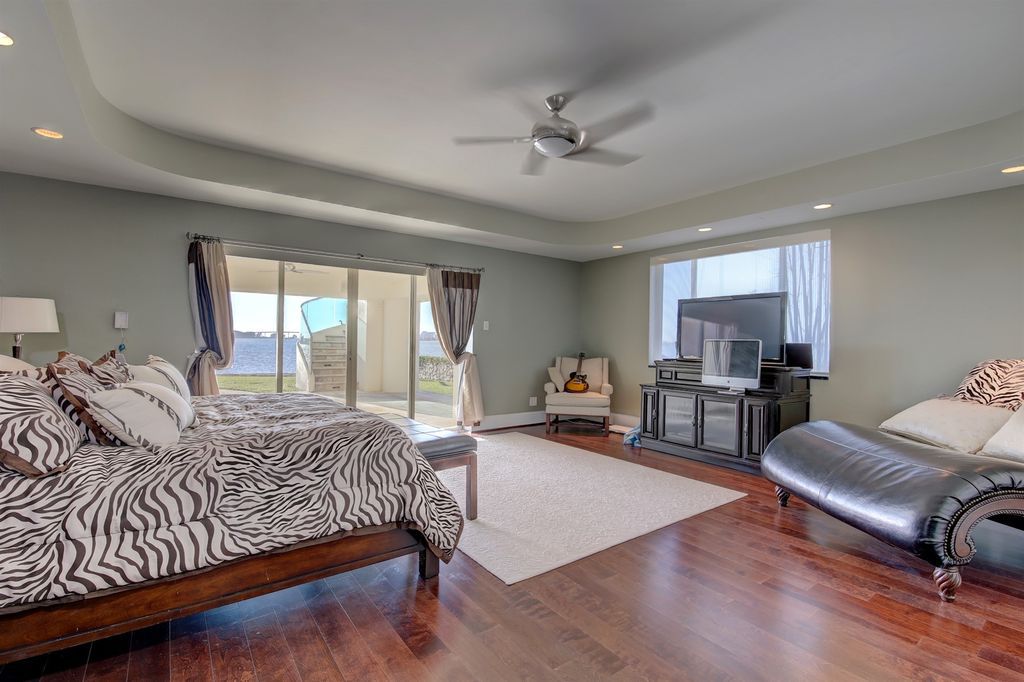 Timeless three level residence with unobstructed Clearwater Harbor views