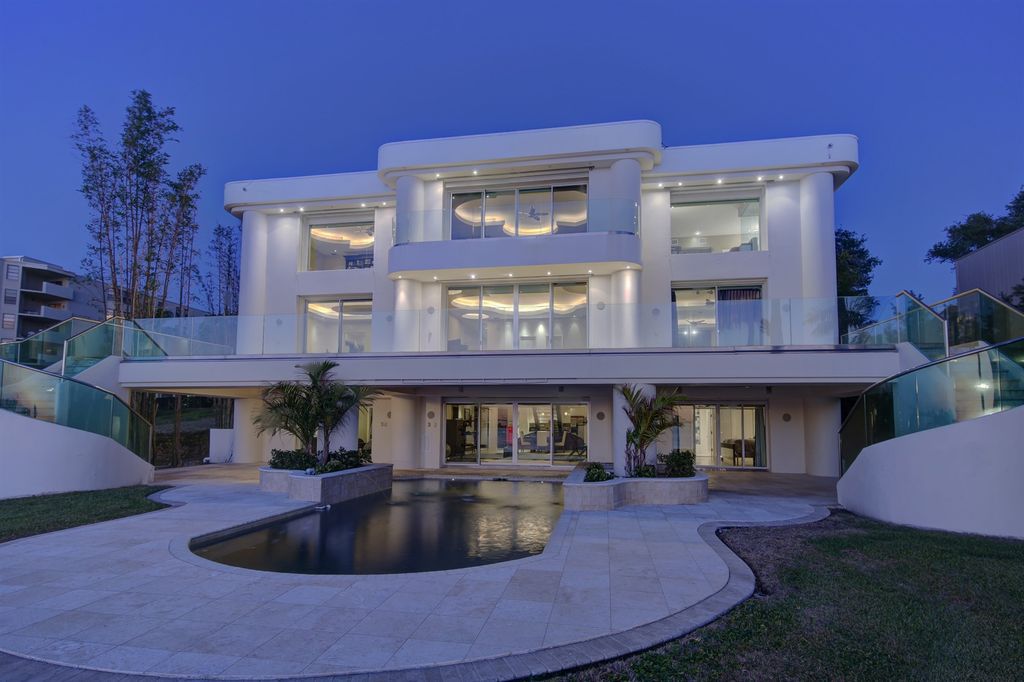 Timeless three level residence with unobstructed Clearwater Harbor views
