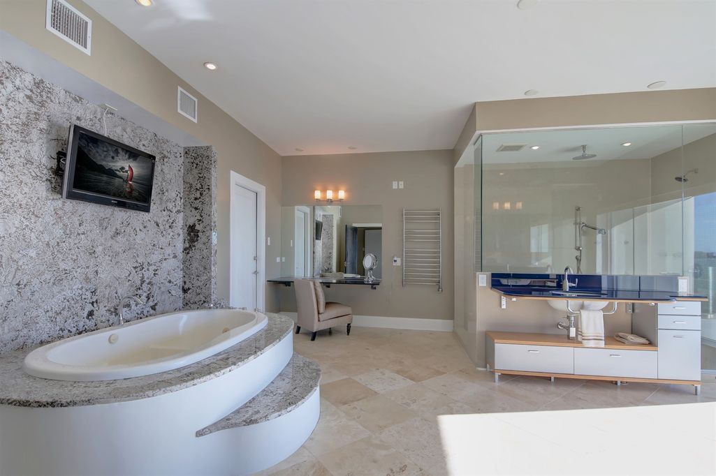 Timeless three level residence with unobstructed Clearwater Harbor views