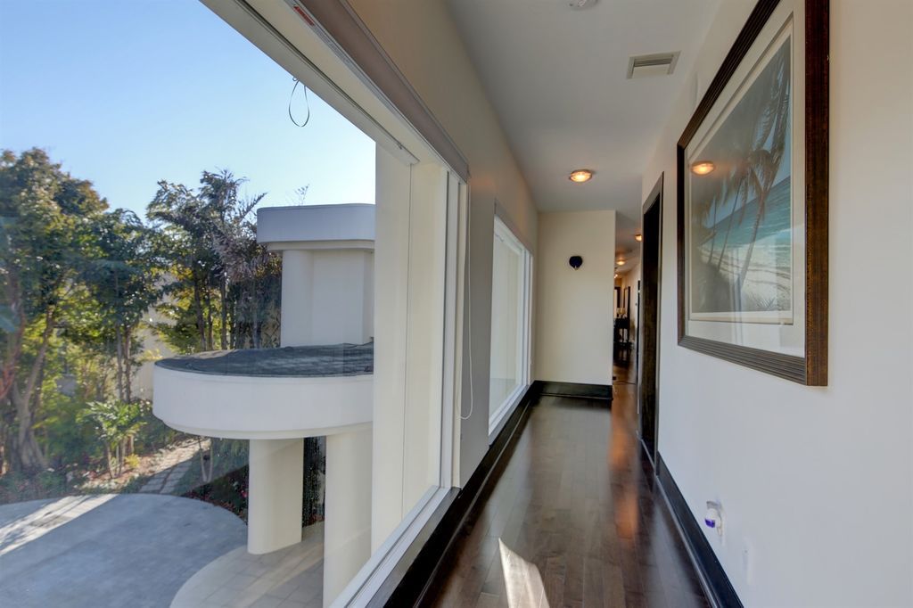 Timeless three level residence with unobstructed Clearwater Harbor views