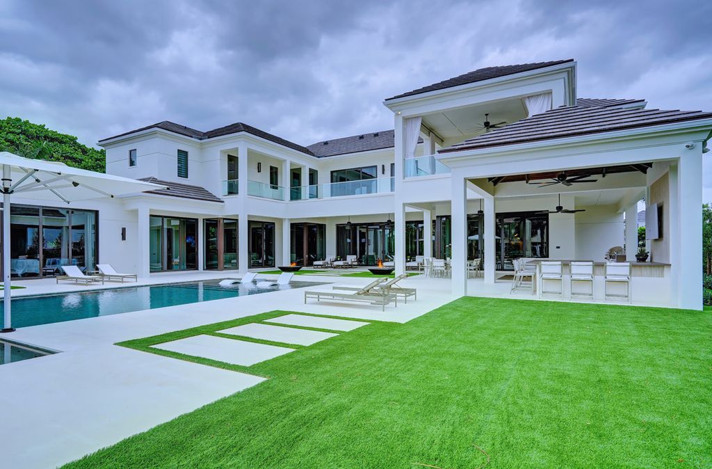 This Waterfront Dreamscape Villa in Boca Raton, Florida, was executed by prestigious SRD Building Corp. This house located in the most luxurious and exclusive of all communities, Royal Palm Yacht & Country Club
