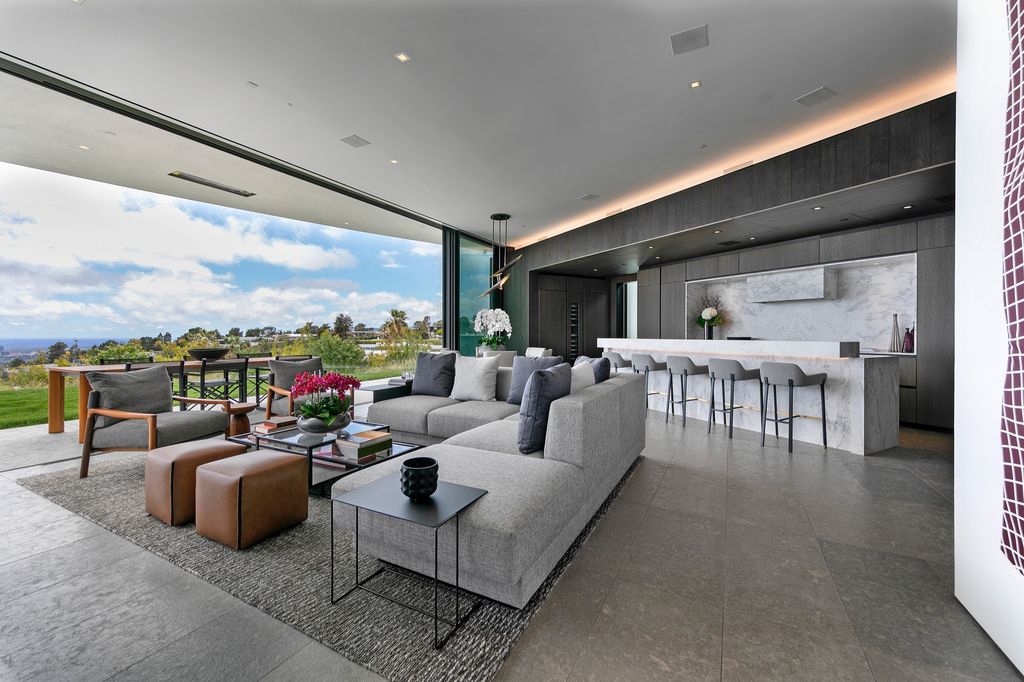 The Mansion in Beverly Hills is a spectacular hillside glass-walled sanctuary with Trousdale Estates most explosive panoramic city to ocean views now available for sale. This home located at 514 Chalette Dr, Beverly Hills, California; offering 6 bedrooms and 11 bathrooms with over 12,000 square feet of living spaces.