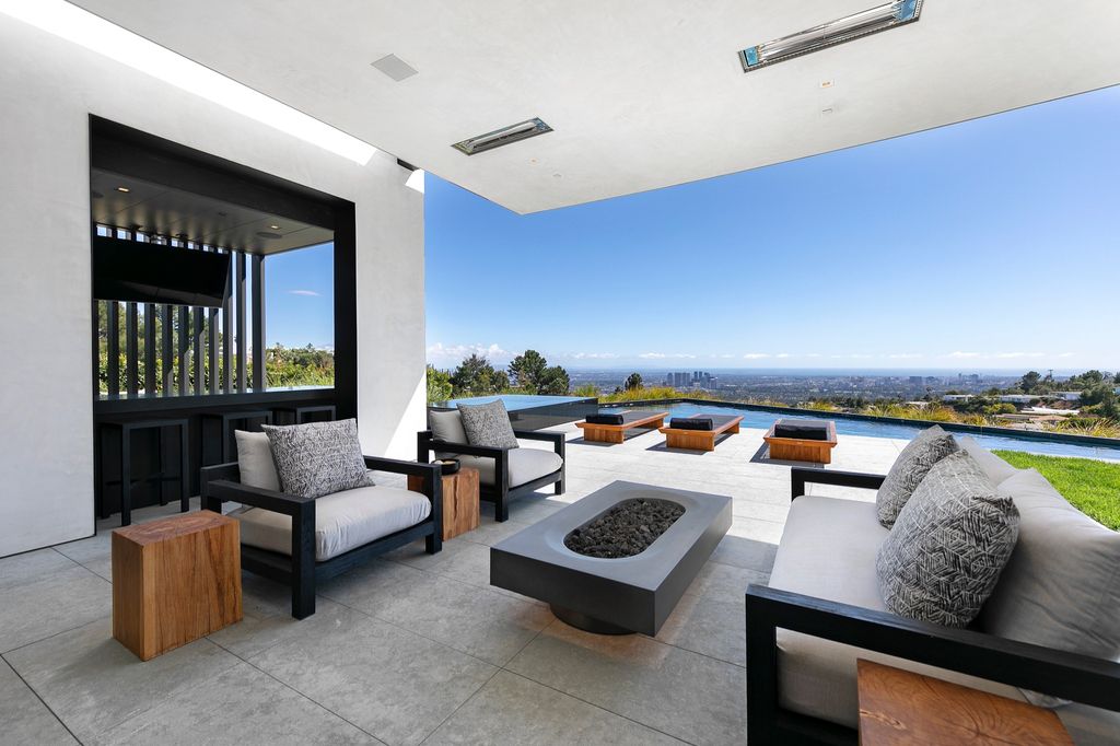 The Mansion in Beverly Hills is a spectacular hillside glass-walled sanctuary with Trousdale Estates most explosive panoramic city to ocean views now available for sale. This home located at 514 Chalette Dr, Beverly Hills, California; offering 6 bedrooms and 11 bathrooms with over 12,000 square feet of living spaces.