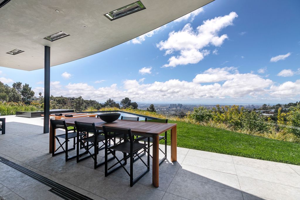 The Mansion in Beverly Hills is a spectacular hillside glass-walled sanctuary with Trousdale Estates most explosive panoramic city to ocean views now available for sale. This home located at 514 Chalette Dr, Beverly Hills, California; offering 6 bedrooms and 11 bathrooms with over 12,000 square feet of living spaces.