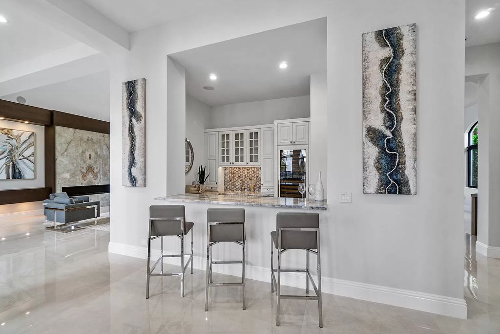 The Transitional Home in Boca Raton is a completely redone estate located in St Andrews one of the most prestigious Country Club now available for sale. This home located at 17530 Foxborough Ln, Boca Raton, Florida