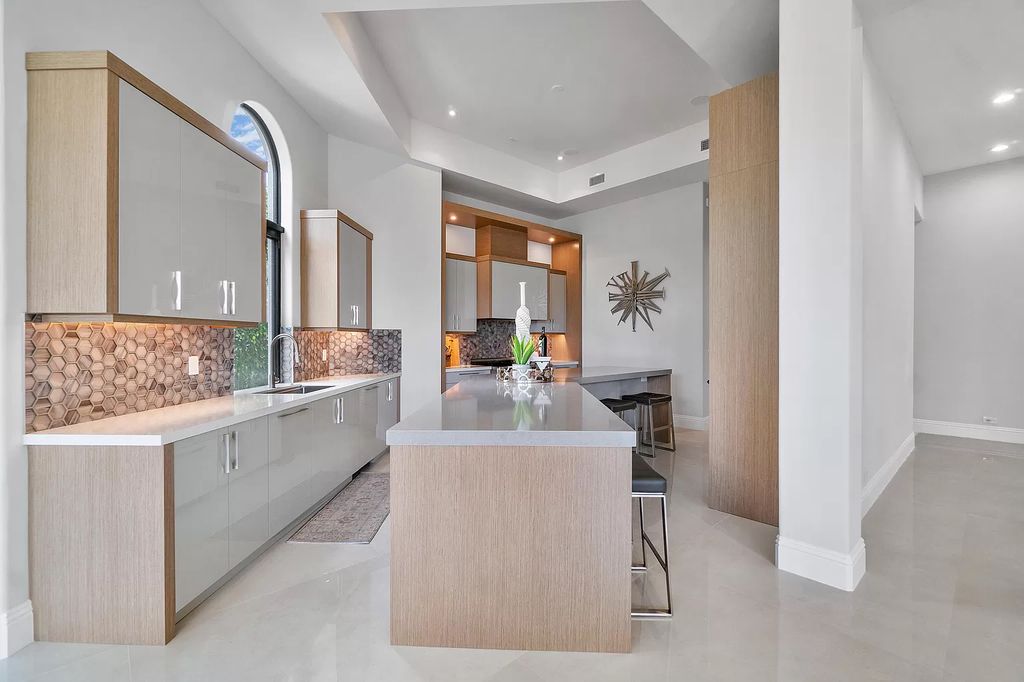 The Transitional Home in Boca Raton is a completely redone estate located in St Andrews one of the most prestigious Country Club now available for sale. This home located at 17530 Foxborough Ln, Boca Raton, Florida