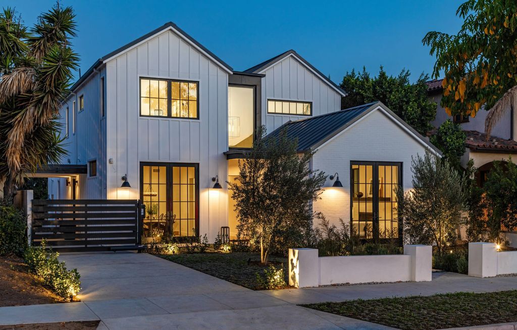 The Modern Farmhouse in Beverly Hills is a timeless, architectural custom-built estate with exclusive, high-end designer finishes now available for sale. This home located at 220 S Wetherly Dr, Beverly Hills, California