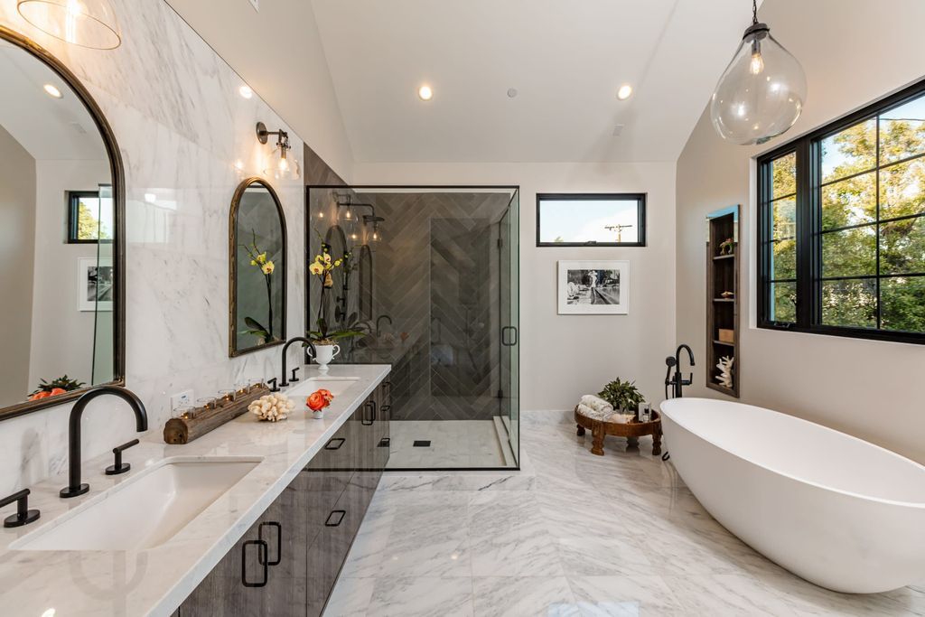 The Modern Farmhouse in Beverly Hills is a timeless, architectural custom-built estate with exclusive, high-end designer finishes now available for sale. This home located at 220 S Wetherly Dr, Beverly Hills, California