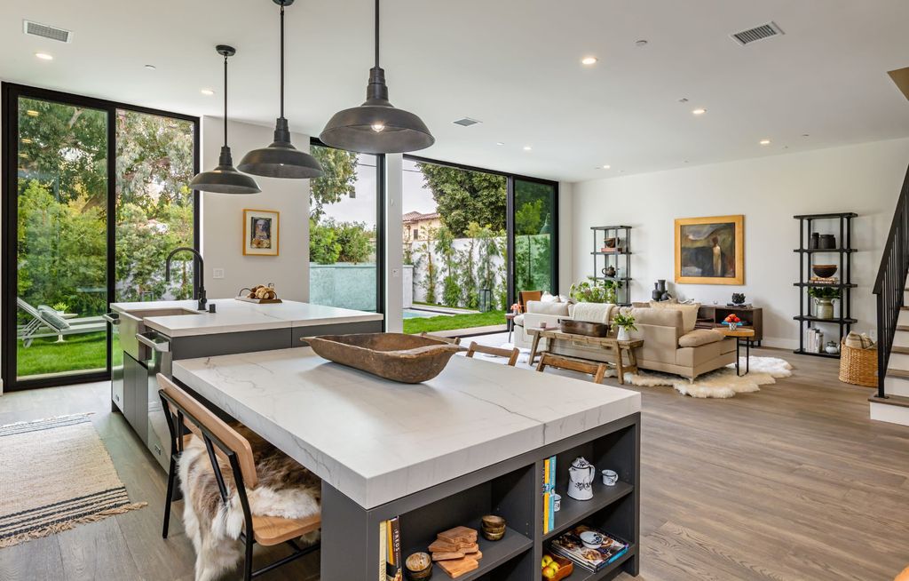 The Modern Farmhouse in Beverly Hills is a timeless, architectural custom-built estate with exclusive, high-end designer finishes now available for sale. This home located at 220 S Wetherly Dr, Beverly Hills, California