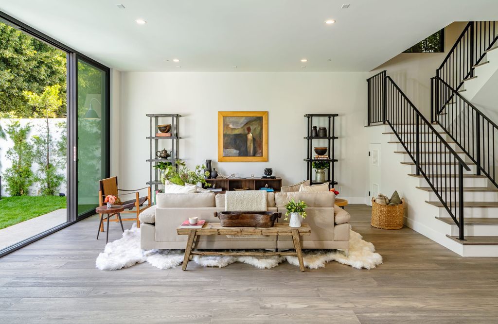 The Modern Farmhouse in Beverly Hills is a timeless, architectural custom-built estate with exclusive, high-end designer finishes now available for sale. This home located at 220 S Wetherly Dr, Beverly Hills, California