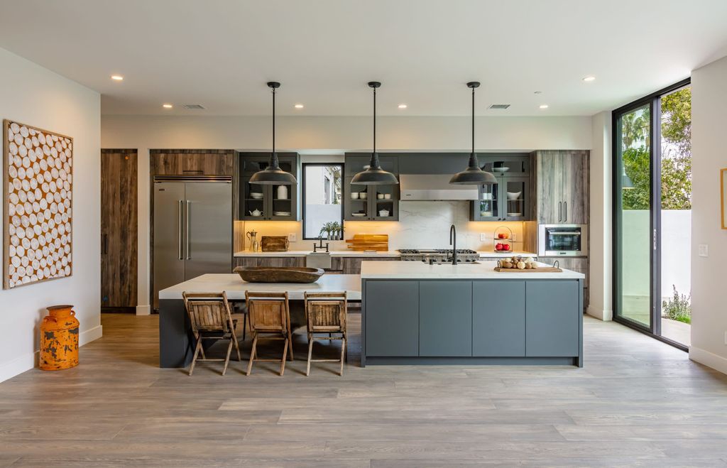 The Modern Farmhouse in Beverly Hills is a timeless, architectural custom-built estate with exclusive, high-end designer finishes now available for sale. This home located at 220 S Wetherly Dr, Beverly Hills, California